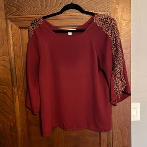 Beautiful maroon colored blouse with glittery lace arm details